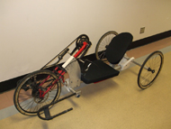 Image 2 – Photograph of the completed initial prototype of the fourth generation handcycle made of aluminum and Duraform® polyamide plastic. 